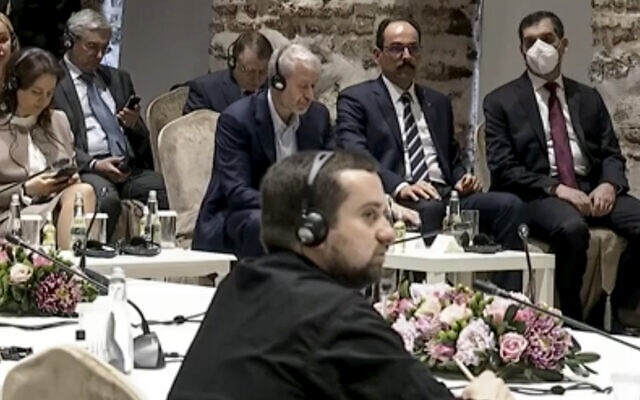In this image taken from a video provided by the Turkish Presidency, Russian Roman Abramovich, top center, 3rd from right, listens to Turkish President Recep Tayyip Erdogan during the Russian and Ukrainian delegations meeting for talks in Istanbul, Turkey, on Tuesday, March 29, 2022. (Turkish Presidency via AP)