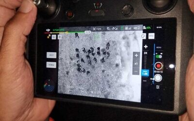 A operator's screen showing a group of school students who were found using a drone after they went missing during a school hike in Nahal Og, March 28, 2022. (Israel Police)