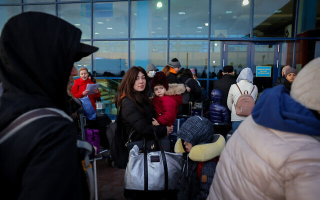 Jewish Ukrainians who fled fighting in Ukraine seen at the Chisinau International Airport in Moldova as they make their way to Israel, March 6, 2022. (Nati Shohat/Flash90)