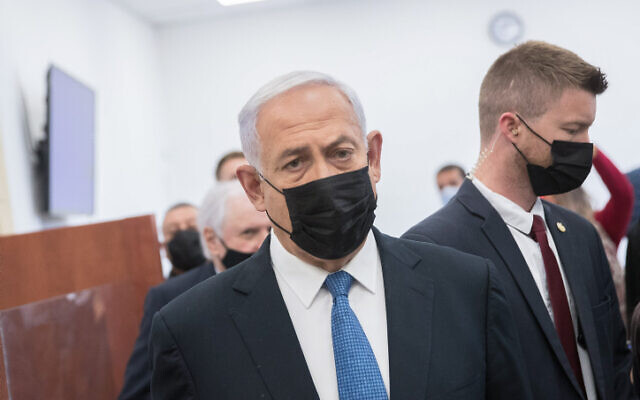 Former Israeli prime minister Benjamin Netanyahu arrives for a court hearing in his trial, at the District Court in Jerusalem on March 28, 2022. (Ohad Zwigenberg/POOL)