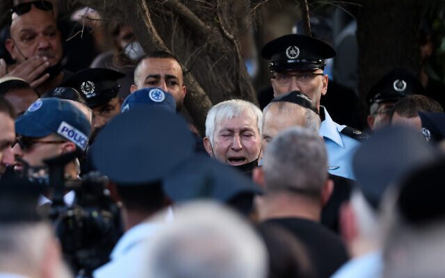 Police officer Amir Khoury's father Jeries at the funeral his son, who was killed in a firefight at a terrorist shooting attack in Bnei Brak, at the cemetery in Nof Hagalil, March 31, 2022. (David Cohen/Flash90)