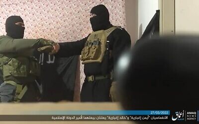 A screen grab from an undated video in which the two terrorists who killed four Israelis in Hadera on March 27, 2022, swear allegiance to the Islamic State terror group (Screen grab)