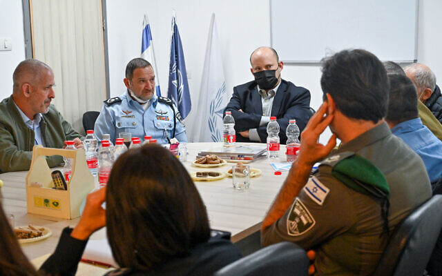 Prime Minister Bennett holds a situation assessment together with Israel Police Inspector General Kobi Shabtai and other senior members of the security forces at Hadera police station, hours after a deadly terror attack in the city, March 27, 2022. (Kobi Gideon / GPO)