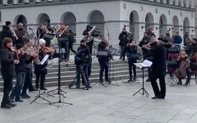A classical orchestra performs in Independence Square in Kyiv on March 9, 2022. (Screen capture/Twitter)