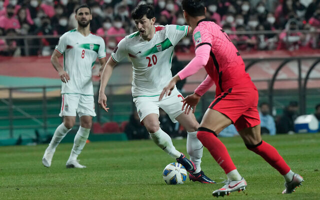 Illustrative: Iranian players, in white, during a qualifying soccer match for the FIFA World Cup Qatar 2022 at Seoul World Cup Stadium in Seoul, South Korea, on March 24, 2022. (AP Photo/ Ahn Young-joon)