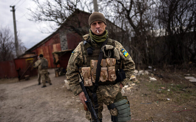 Ukrainian soldiers near the frontline in Brovary, on the outskirts of Kyiv, Ukraine, March 28, 2022. (AP Photo/Rodrigo Abd)