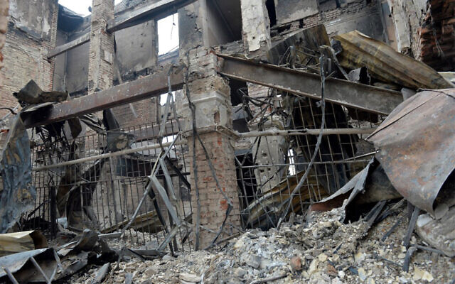 A destroyed school near the center of Ukrainian city of Kharkiv, February 28, 2022. (Sergey Bobok/AFP)