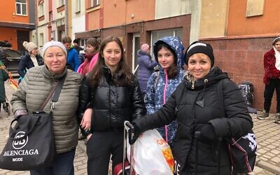 A Ukranian-Israeli family, including teenagers Valerina and Vera, leave behind a war-torn Ukraine from Lviv on March 2, 2022 (Credit: Lazar Berman)