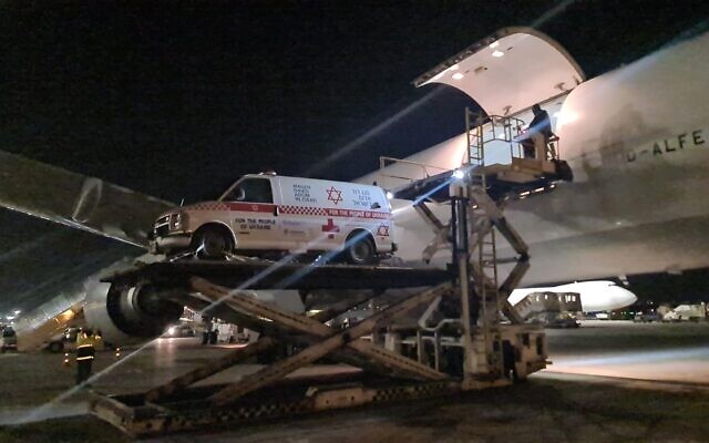 A bulletproof MDA ambulance is loaded onto a flight at Ben Gurion Airport, on March 16, 2022. (Magen David Adom)