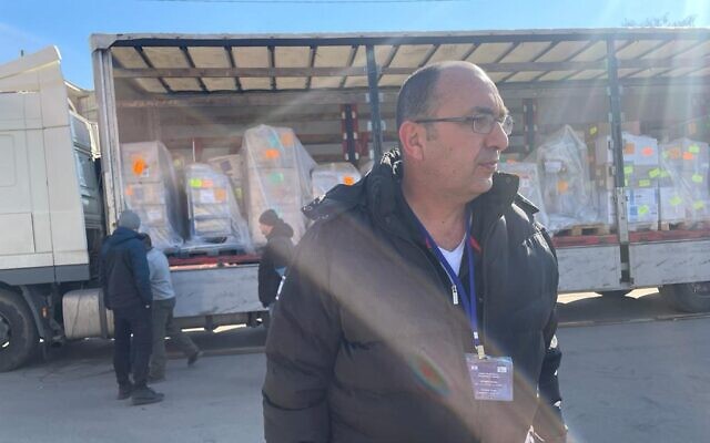 Yehuda Katzura, head of logistics for Sheba Medical Center, at the Israeli field hospital being established in Mostyska, Ukraine. on March 19, 2022. (Carrie Keller-Lynn/The Times of Israel)