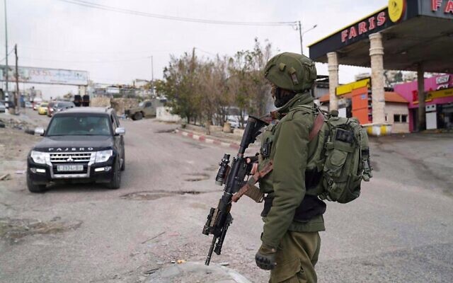 Israeli troops are seen in the Palestinian town of Hizme, northeast of Jerusalem, March 3, 2022. (Israel Defense Forces)