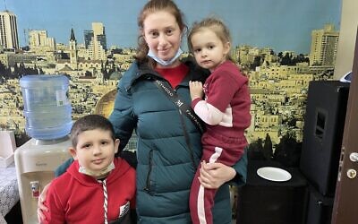 Anna, with Vadik, 6, and Dasha, 3, at the Israeli Consulate in Chisinau, Moldova, March 17, 2022. (Sue Surkes/Times of Israel)