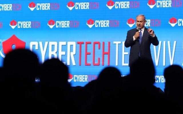 Opposition leader Benjamin Netanyahu addresses the audience at Tel Aviv's CyberTech conference, March 3, 2022. (Gilad Kavalerchik)