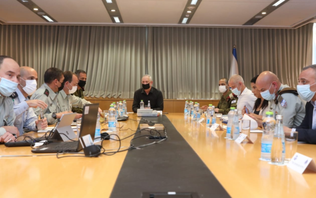 Defense Minister Benny Gantz meets with top security and military officials on March 30, 2022, following several deadly terror attacks in Israel. (Elad Malka/Defense Ministry)