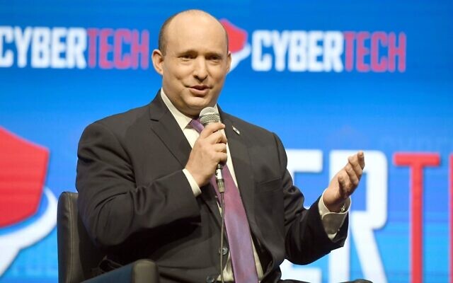 Prime Minister Naftali Bennett speaks at the Tel Aviv’s CyberTech conference, March 3, 2022. (Haim Zach/GPO)