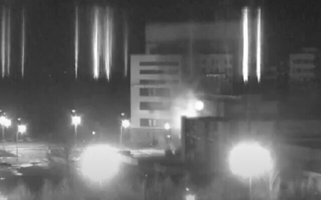 A still from a video showing a building on fire at the Zaporizhzhya nuclear power plant in Ukraine on March 2, 2022. (Screen capture: YouTube)
