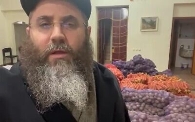 Kherson region Chief Rabbi Yosef Wolff, with the supplies he managed to bring to Kherson city from Crimea, on March 10, 2022. (Screenshot)