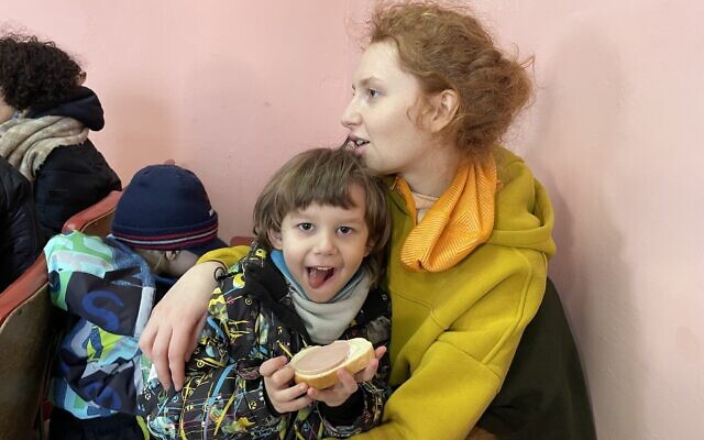 Yanna Chernega and Leonid, 4, at the reception center in Otaci, Moldova, run by Christians for Israel, March 15, 2022. (Sue Surkes/Times of Israel)