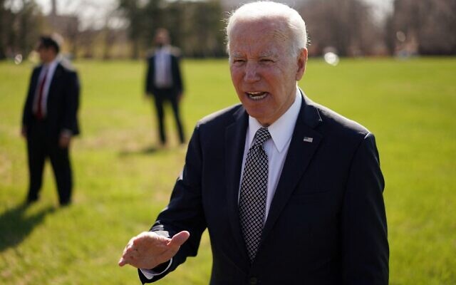 US President Joe Biden speaks to reporters upon arriving at Fort McNair in Washington on April 4, 2022. (Mangel Ngan/AFP)
