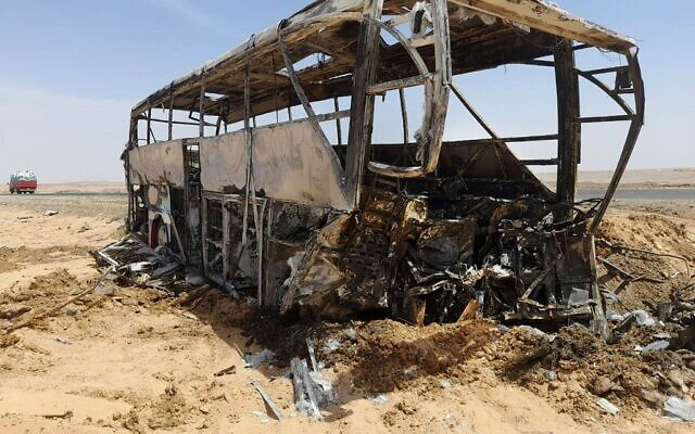 A picture shows the scene of a bus accident which occurred in early hours of April 13, 2022 when the vehicle collided with a car as it was transporting tourists on a road between Aswan and the famed Abu Simbel temple further south. (AFP) A picture shows the scene of a bus accident which occurred in early hours of April 13, 2022 when the vehicle collided with a car as it was transporting tourists on a road between Aswan and the famed Abu Simbel temple further south. (AFP)