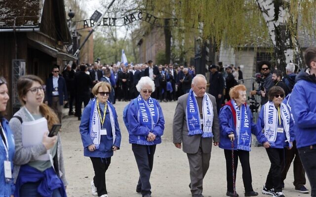 Holocaust survivors take part in The March of the Living in honour of the victims of the Holocaust, at the site of the Memorial and Museum Auschwitz-Birkenau in Oswiecim, Poland, on April 28, 2022. (Wojtek Radwanski/AFP)