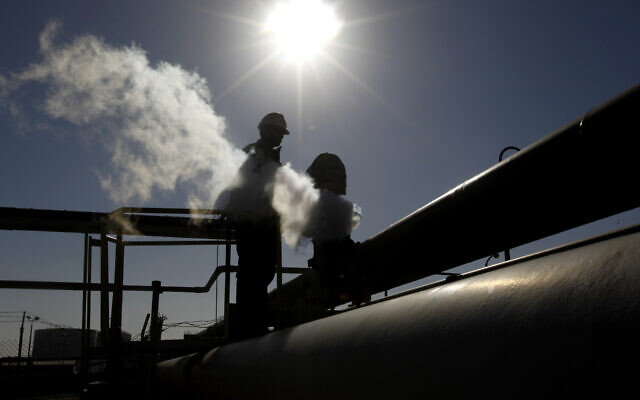 In this illustrative photo from February 2011, a Libyan oil worker, works at a refinery inside the Brega oil complex, in Brega, eastern Libya. (AP Photo/Hussein Malla, File)