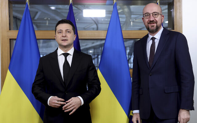 Illustrative: European Council President Charles Michel, right, greets Ukraine's President Volodymyr Zelensky prior to a bilateral meeting on the sidelines of an Eastern Partnership Summit in Brussels, on December 15, 2021. (Kenzo Tribouillard, Pool Photo via AP)