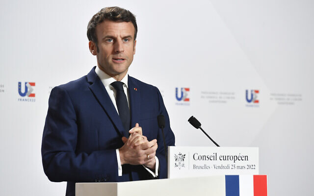 French President Emmanuel Macron speaks during a media conference after an EU summit in Brussels, March 25, 2022. (AP Photo/Geert Vanden Wijngaert)