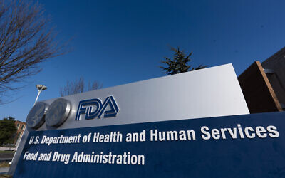 A sign for the Food and Drug Administration is seen in Silver Spring, Maryland, on December 10, 2020. (AP Photo/Manuel Balce Ceneta)