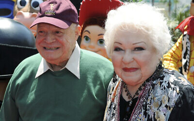 Estelle Harris, right, and Don Rickles arrive at the world premiere of 'Toy Story 3,' Sunday, June 13, 2010, at The El Capitan Theater in Los Angeles. Harris, who hollered her way into TV history as George Costanza’s short-fused mother on TV’s 'Seinfeld' and voiced Mrs. Potato Head in the 'Toy Story' franchise, has died. She was 93. Harris’ agent Michael Eisenstadt confirmed the actor’s death in Palm Desert, CA, late Saturday, April 2, 2022. (AP Photo/Katy Winn, File)