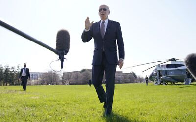 US President Joe Biden speaks to the media at Fort Lesley J. McNair, on Monday, April 4, 2022, as he returns to Washington and the White House after spending the weekend in Wilmington, Delaware. (AP Photo/Andrew Harnik)