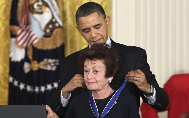 Then US President Barack Obama presents Jewish Holocaust survivor Gerda Weissmann Klein, a 2010 Presidential Medal of Freedom on February 15, 2011, during a ceremony in the East Room of the White House in Washington, DC. (AP Photo/Carolyn Kaster, File)