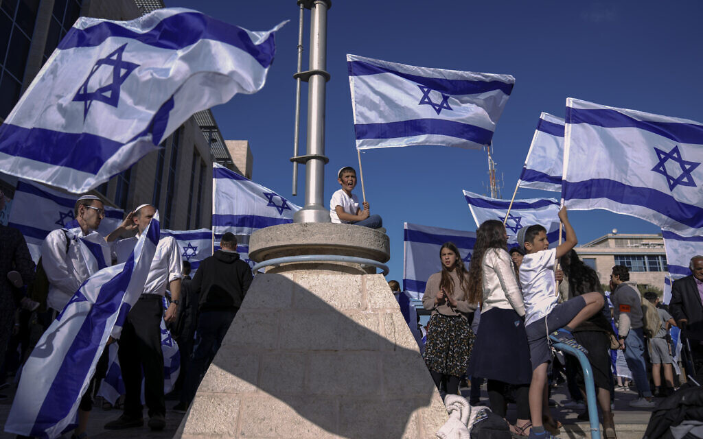 Israeli right wing activists gather for a march  in Jerusalem, Wednesday, April 20, 2022. (AP/Ariel Schalit)