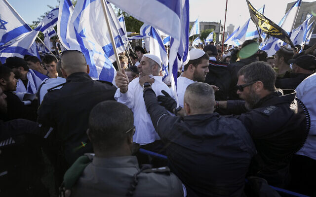 Israeli police block right wing activists from marching towards the Old City, in Jerusalem, Wednesday, April 20, 2022. (AP/Ariel Schalit)