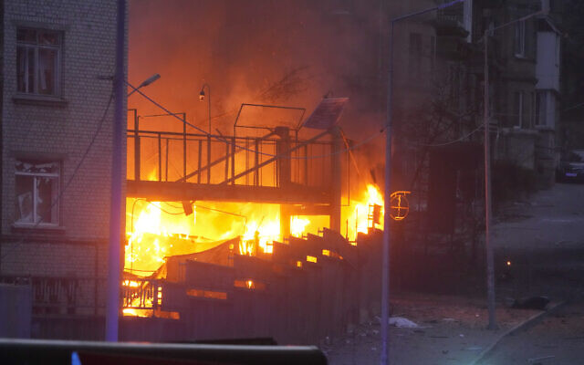 A fire after a Russian rocket attack is seen in Kyiv, Ukraine, on Thursday, April 28, 2022. (AP Photo/Efrem Lukatsky)