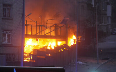 A fire after a Russian rocket attack is seen in Kyiv, Ukraine, April 28, 2022. (AP Photo/Efrem Lukatsky)