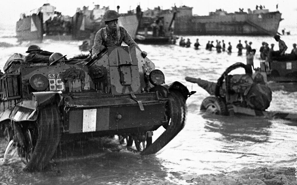 Allied Forces, troops, guns and transport are rushed ashore, ready for action, July 10, 1943, at the opening of the Allied invasion of the Italian island of Sicily. (AP Photo/BOP)
