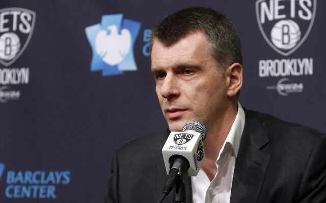 Brooklyn Nets former owner Mikhail Prokhorov, of Russia, holds a news conference before an NBA basketball game between the Atlanta Hawks and the Brooklyn Nets in New York, April 8, 2015. (AP Photo/Jason DeCrow)