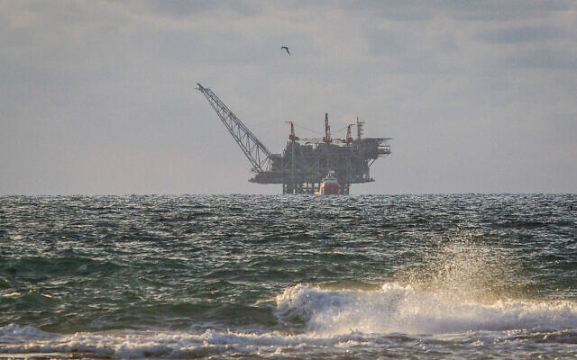 View of the Israeli Leviathan natural gas field gas processing rig as seen from Dor Habonim Beach Nature Reserve, on January 1, 2020. (Flash90)