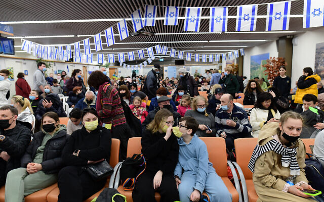 Jewish immigrants fleeing from war zones in the Ukraine arrive at the immigration and absorption office, at Ben Gurion airport near Tel Aviv, on March 15, 2022. (Tomer Neuberg/Flash90)