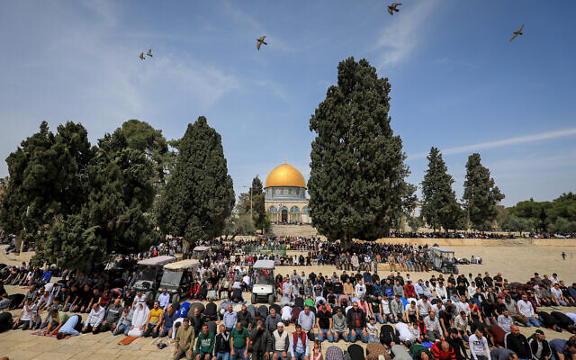 Palestinians attend Friday prayers at the Al-Aqsa Mosque compound on the Temple Mount in the Old City of Jerusalem, on April 1, 2022. (Jamal Awad/Flash90)
