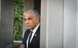 Foreign Minister Yair Lapid at Damascus Gate in Jerusalem's Old City, on April 3, 2022. (Arie Leib Abrams/Flash90)