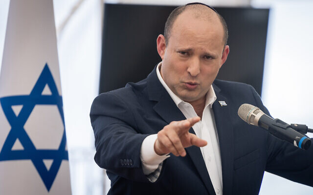 Prime Minister Naftali Bennett holds a press conference at the Judea and Samaria Division military base, near the West Bank settlement of Beit El, April 5, 2022. (Yonatan Sindel/Flash90)