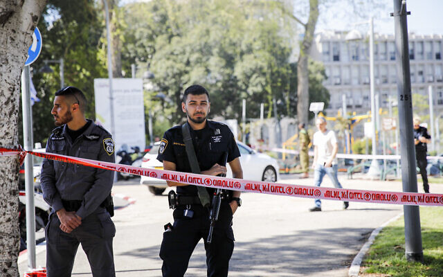 Police officers at the scene of a suspected terror stabbing in Hafia, on April 15, 2022. (Shir Torem/Flash90)