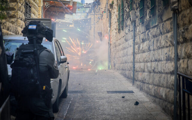 Israeli police officers, during clashes outside the Al Aqsa Mosque, in Jerusalem's Old City on April 17, 2022. (Jamal Awad/ Flash90)