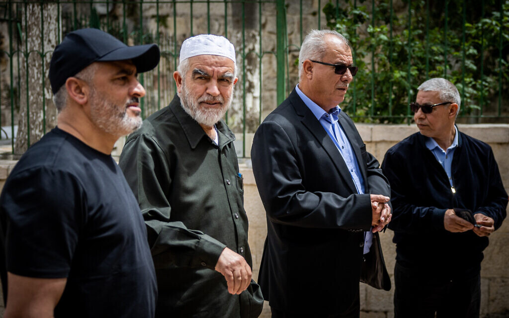 leader of the Northern Branch of the Islamic Movement Raed Salah and Mohammad Barakeh, chairman of the monitoring committee arrive for a visit at the Temple Mount in Jerusalem's Old City on April 19, 2022. (Yonatan Sindel/Flash90)