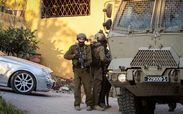 File: Israeli soldiers seen during a raid in the village of Salem, east of the city of Nablus, in the West Bank, on April 20, 2022. (Nasser Ishtayeh/Flash90)