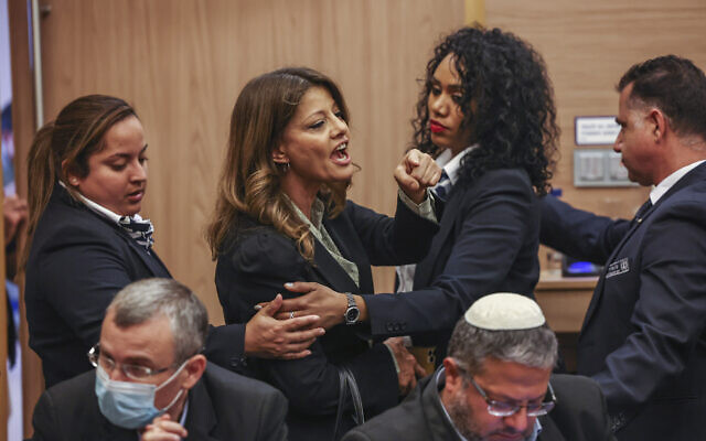 Likud MK Orly Levy-Abekasis is ejected from the Knesset House Committee hearing on Yamina's request to declare MK Amichai Chikli a "defector" from the party, April 25, 2022. (Yonatan Sindel/Flash90)