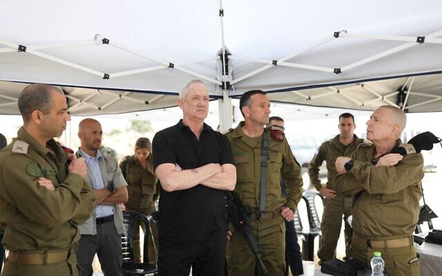 Then-Defense Minister Benny Gantz tours the West Bank security barrier, on April 12, 2022. (Elad Malka/Defense Ministry)