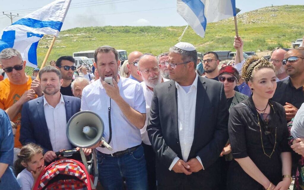 Samaria Regional Council head Yossi Dagan, center, leads a march to Homesh alongside MKs Itamar Ben Gvir, second right, Idit Silman, right, and Bezalel Smotrich, left. (Samaria Regional Council)